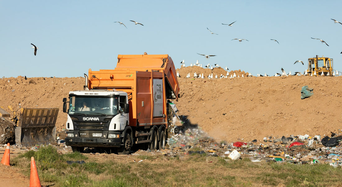 garbage truck on waste disposal site